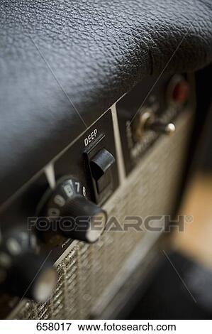 Stock Photo - extreme Close-up angled shot of an amplifier. Fotosearch