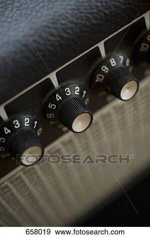 Stock Photo - extreme Close-up angled shot of an amplifier. Fotosearch