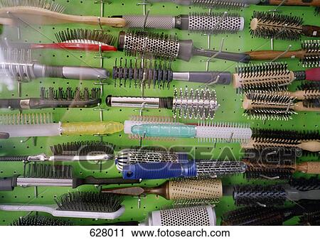 Stock Image - Hairbrushes on a rack. Fotosearch