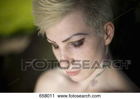 Stock Image - Portrait of a young punk woman. Fotosearch