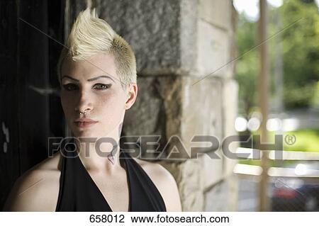 Stock Image - Portrait of a young punk woman. Fotosearch