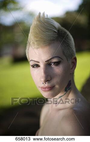 Portrait of a young punk woman View Large Photo Image Stock Image - Portrait of a young punk woman. Fotosearch