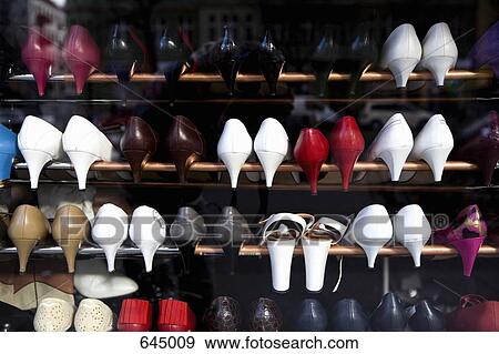 Stock Photo - Rows of high heel shoes. Fotosearch