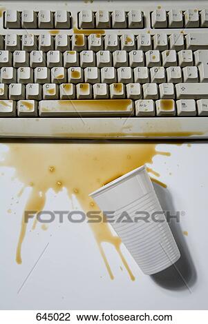 Spilled coffee on a computer keyboard View Large Photo Image Stock Image - Spilled coffee on a computer keyboard. Fotosearch
