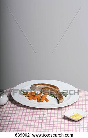 Still life of a plate of sausages View Large Photo Image Stock Image - Still life of a plate of sausages. Fotosearch