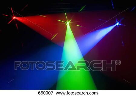 Three multi colored spotlights crossing light beams View Large Photo Image Stock Photo - Three multi colored spotlights crossing light beams. Fotosearch