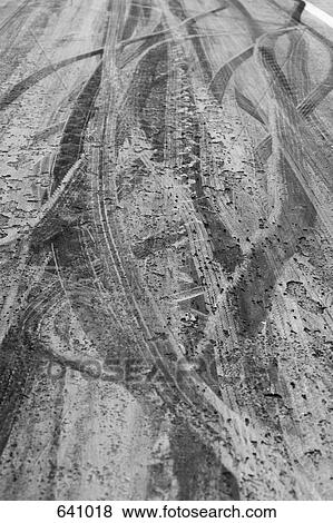 Tire marks on a race track View Large Photo Image Stock Photo - Tire marks on a race track. Fotosearch