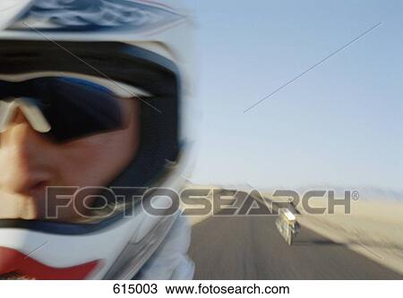 Stock Image - Two motorcyclists. Fotosearch