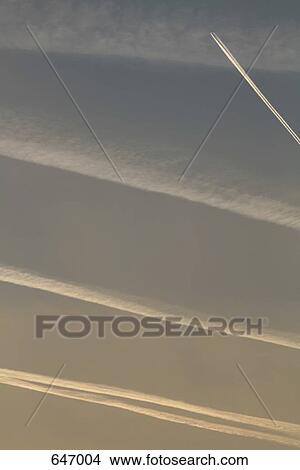 Vapor trails in the sky View Large Photo Image Picture - Vapor trails in the sky. Fotosearch