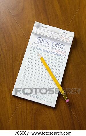 A guest check order pad and pencil View Large Photo Image Stock Photo - A guest check order pad and pencil. Fotosearch