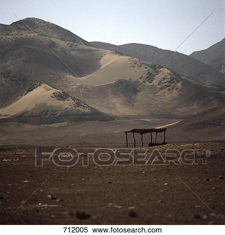 A hut in a barren landscape View Large Photo Image Stock Photography - A hut in a barren landscape. Fotosearch