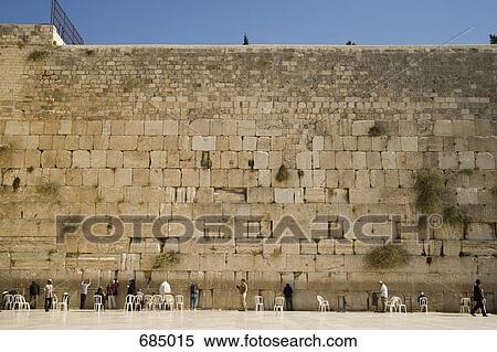 A large group of men praying at the Wailing Wall View Large Photo Image Stock Photography - A large group of men praying at the Wailing Wall. Fotosearch