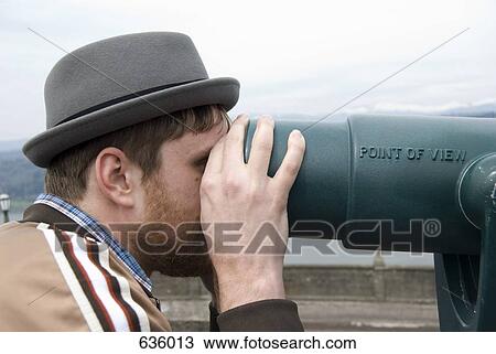 A man looking through a viewfinder, Oregon View Large Photo Image Stock Image - A man looking through a viewfinder, Oregon. Fotosearch