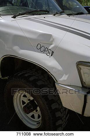 A truck with a dent and the word oops written on it View Large Photo Image Stock Photo - A truck with a dent and the word oops written on it. Fotosearch