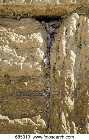 Prayers in the cracks of the Wailing Wall, close-up View Large Photo Image Stock Image - Prayers in the cracks of the Wailing Wall, close-up. Fotosearch