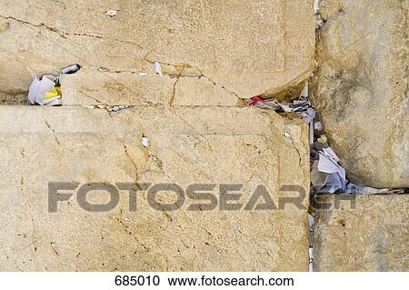 Slips of paper with prayers on them in the crevices of the Wailing Wall, Jerusalem View Large Photo Image Stock Image - Slips of paper with prayers on them in the crevices of the Wailing Wall, Jerusalem. Fotosearch