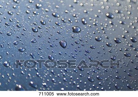 Water drops on a surface View Large Photo Image Stock Photography - Water drops on a surface. Fotosearch