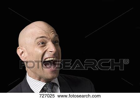 A business man pulling a funny face View Large Photo Image Stock Photography - A business man pulling a funny face. Fotosearch