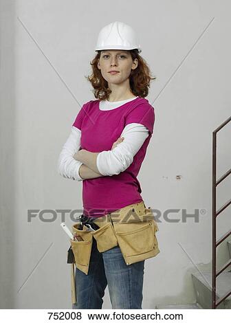 A female construction worker, portrait View Large Photo Image Stock Photo - A female construction worker, portrait. Fotosearch