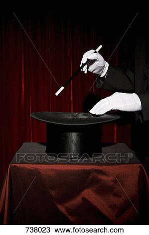 A magician's gloved hands performing a magic trick View Large Photo Image Stock Image - A magician's gloved hands performing a magic trick. Fotosearch