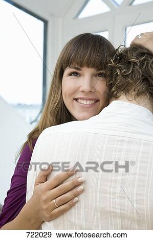 A man and woman embracing View Large Photo Image Stock Photo - A man and woman embracing. Fotosearch