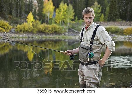 A man fly fishing View Large Photo Image Stock Photography - A man fly fishing. Fotosearch