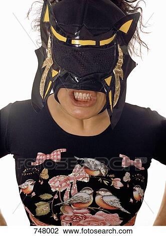 A woman wearing a wrestling mask View Large Photo Image Stock Image - A woman wearing a wrestling mask. Fotosearch