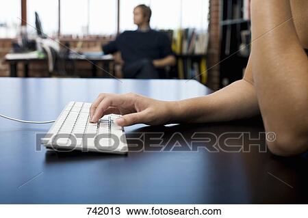 A woman's hands typing View Large Photo Image Stock Image - A woman's hands typing. Fotosearch
