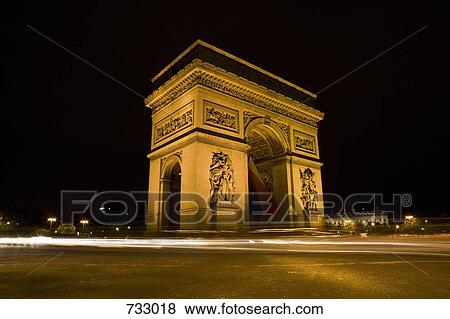 Stock Photo - Arc De Triomphe at night. Fotosearch