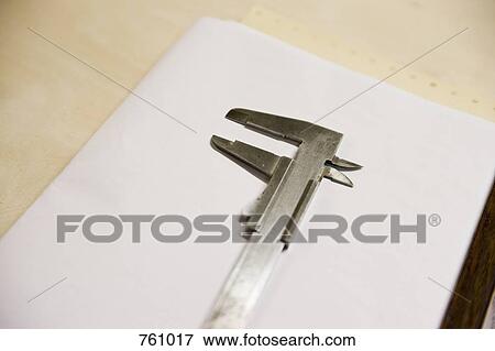 Caliper on a workbench View Large Photo Image Stock Photo - Caliper on a workbench. Fotosearch