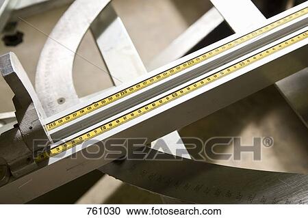 Stock Image - Detail of a sliding ruler. Fotosearch