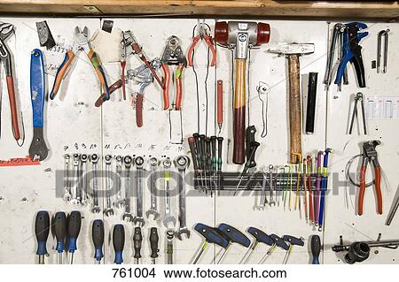 Hand tools arranged on a wall View Large Photo Image Picture - Hand tools arranged on a wall. Fotosearch