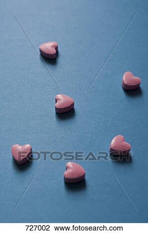 Heart-shaped candies View Large Photo Image Stock Image - Heart-shaped candies. Fotosearch