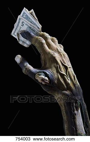 Monster's hand holding money View Large Photo Image Stock Image - Monster's hand holding money. Fotosearch