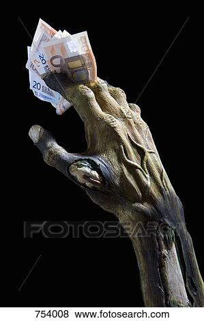 Monster's hand holding money View Large Photo Image Stock Photo - Monster's hand holding money. Fotosearch