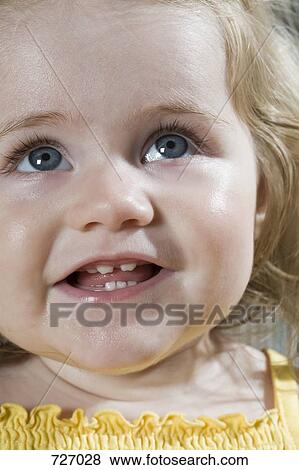 Portrait of a young girl View Large Photo Image Stock Photo - Portrait of a young girl. Fotosearch