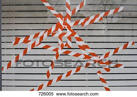 Red and white tape on a broken window View Large Photo Image Stock Photography - Red and white tape on a broken window. Fotosearch