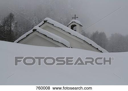 Roof of a snow covered church View Large Photo Image Stock Photo - Roof of a snow covered church. Fotosearch
