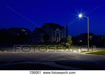 Suburban houses at night View Large Photo Image Stock Image - Suburban houses at night. Fotosearch