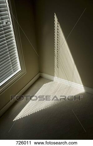 Sunlight shining through a window View Large Photo Image Stock Image - Sunlight shining through a window. Fotosearch