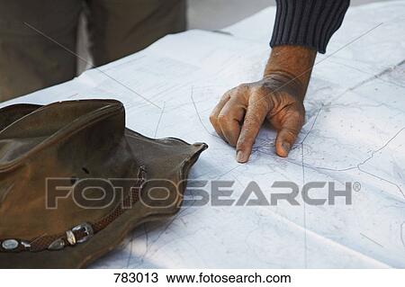 A hand pointing on a map, Namibia View Large Photo Image Stock Image - A hand pointing on a map, Namibia. Fotosearch