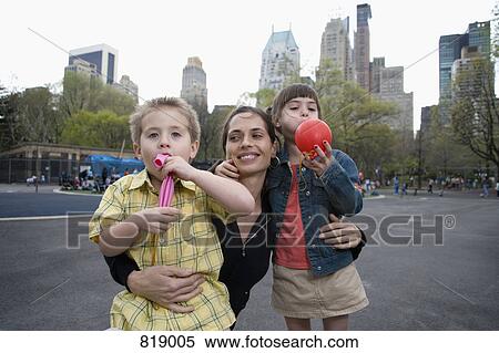 A woman with her children in Central Park, New York City View Large Photo Image Stock Photography - A woman with her children in Central Park, New York City. Fotosearch