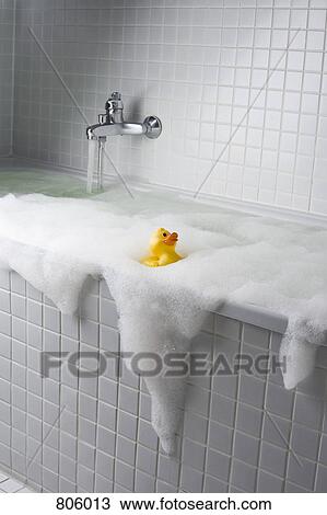 An overflowing bubble bath View Large Photo Image Stock Image - An overflowing bubble bath. Fotosearch