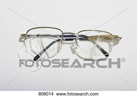 Picture - Broken eyeglasses. Fotosearch