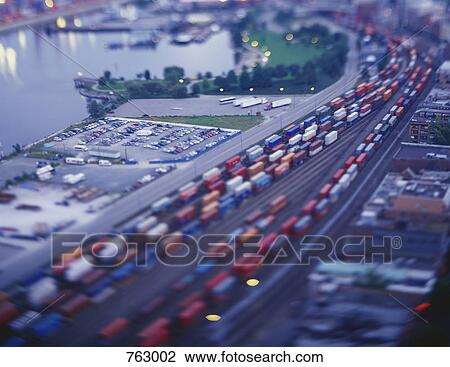 Cargo trains in a shunting yard, tilt-shift photography View Large Photo Image Stock Image - Cargo trains in a shunting yard, tilt-shift photography. Fotosearch