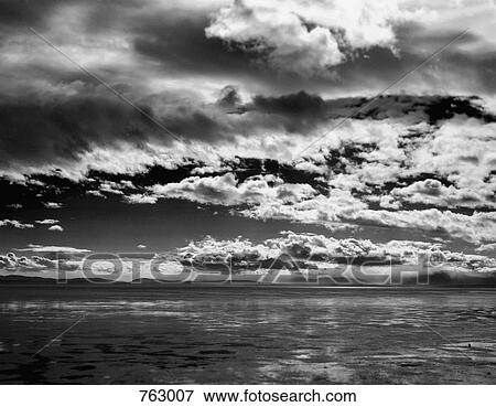 Clouds over a lake View Large Photo Image Stock Photo - Clouds over a lake. Fotosearch
