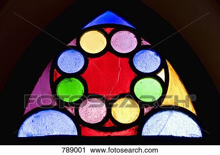 Stock Image - Detail of a stained glass window, Iglesia Cathedral Nuestra Señora del Rosario, Cafayate, Argentina. Fotosearch