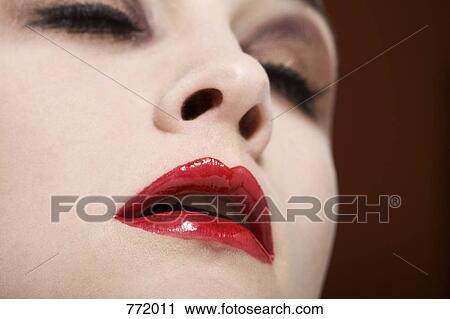 Glamorous woman with her eyes closed View Large Photo Image Stock Image - Glamorous woman with her eyes closed. Fotosearch