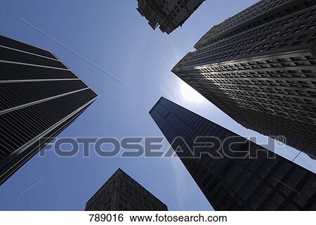 Stock Photograph - Low angle view of skyscrapers, Manhattan, New York City, USA. Fotosearch