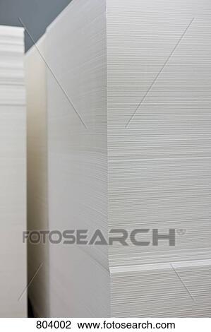Stacks of white paper at a printers View Large Photo Image Stock Image - Stacks of white paper at a printers. Fotosearch